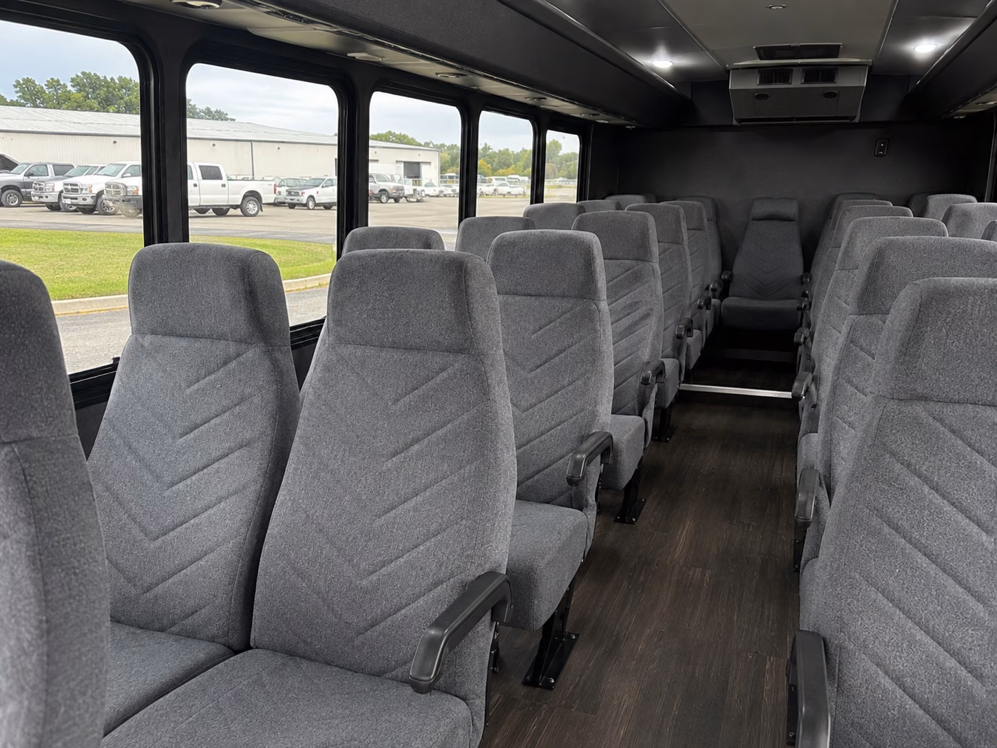 orange 20 passenger minibus inside