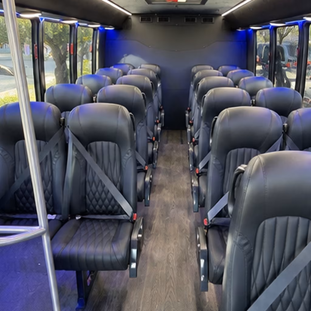 orange 25 passenger minibus inside
