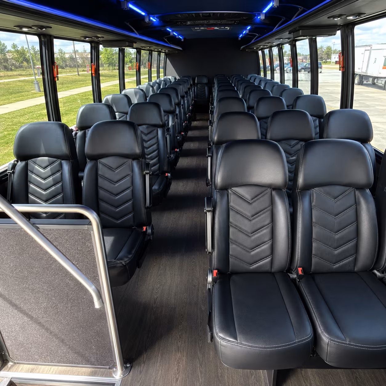 orange 28 passenger minibus inside