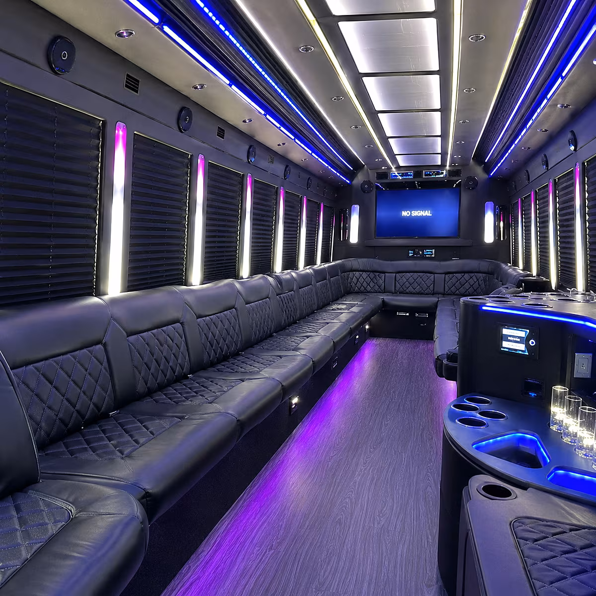 orange 30 passenger party bus inside