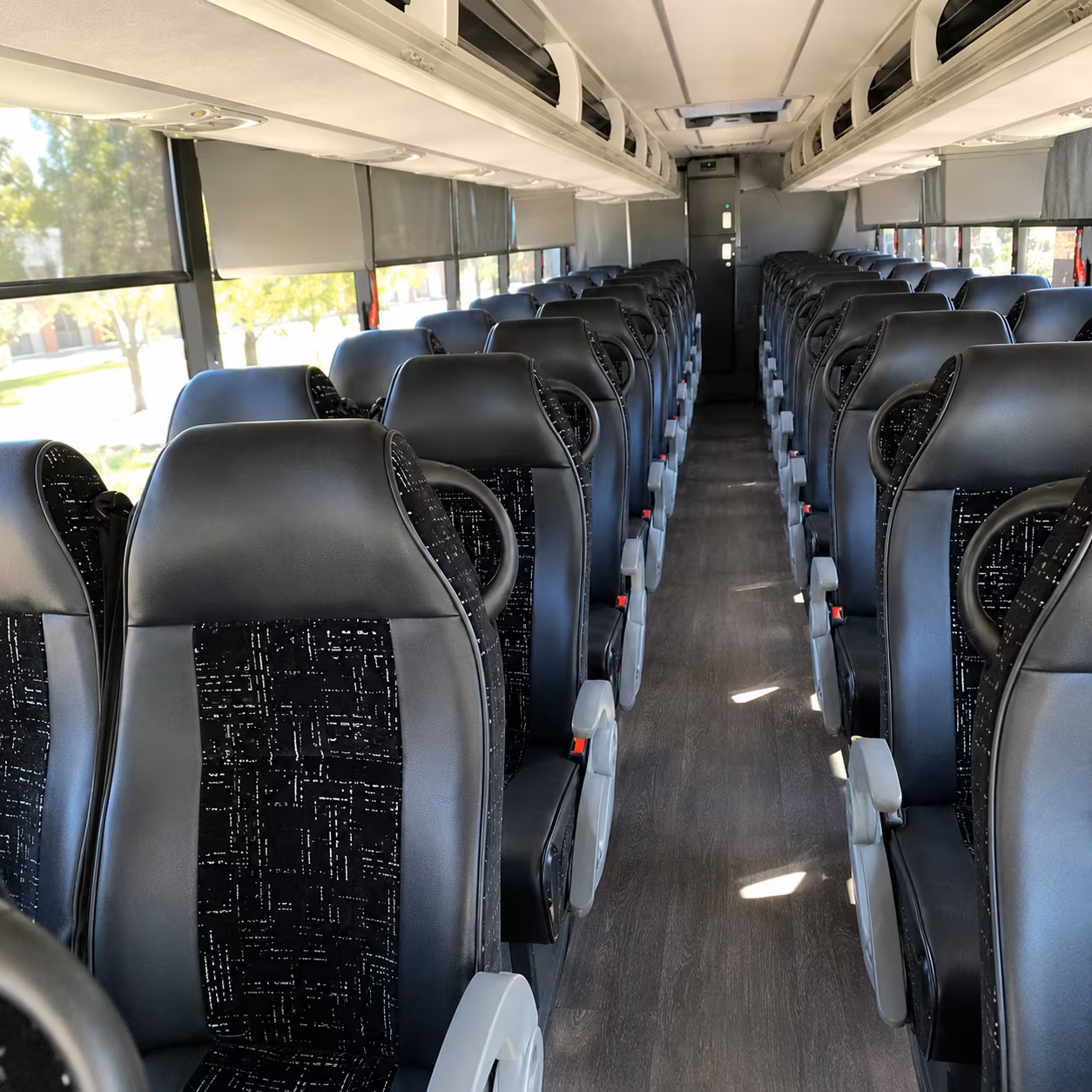orange 56 passenger charter bus inside