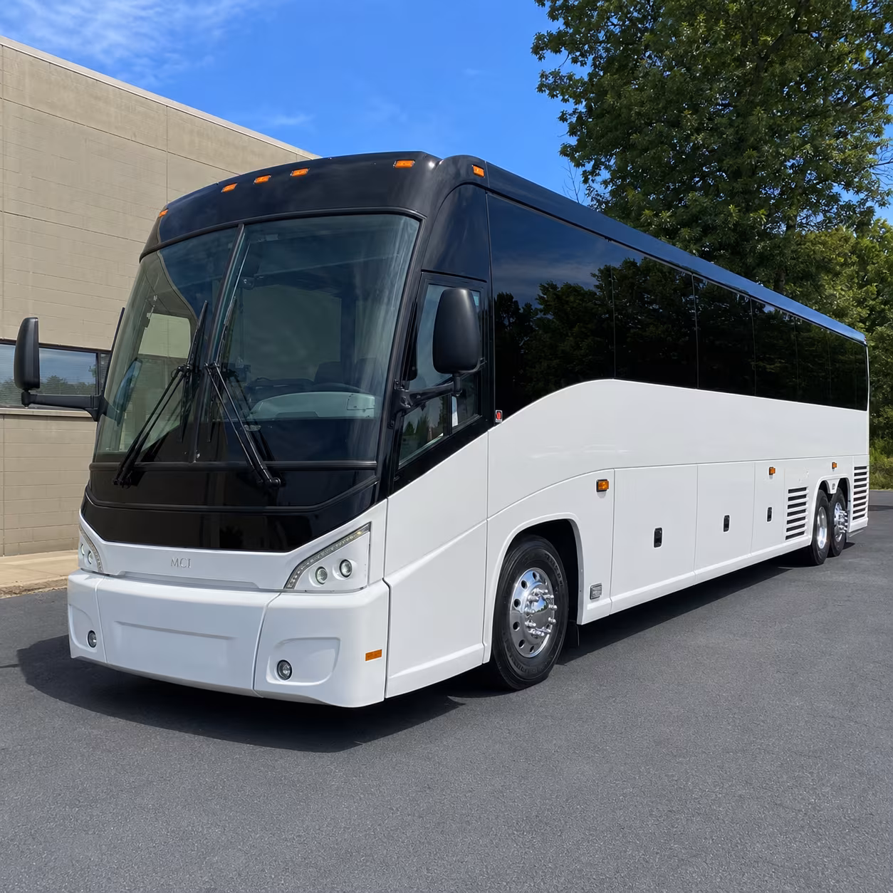 orange 56 passenger charter bus