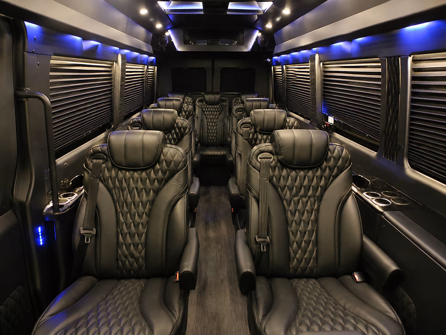 orange sprinter van with driver inside