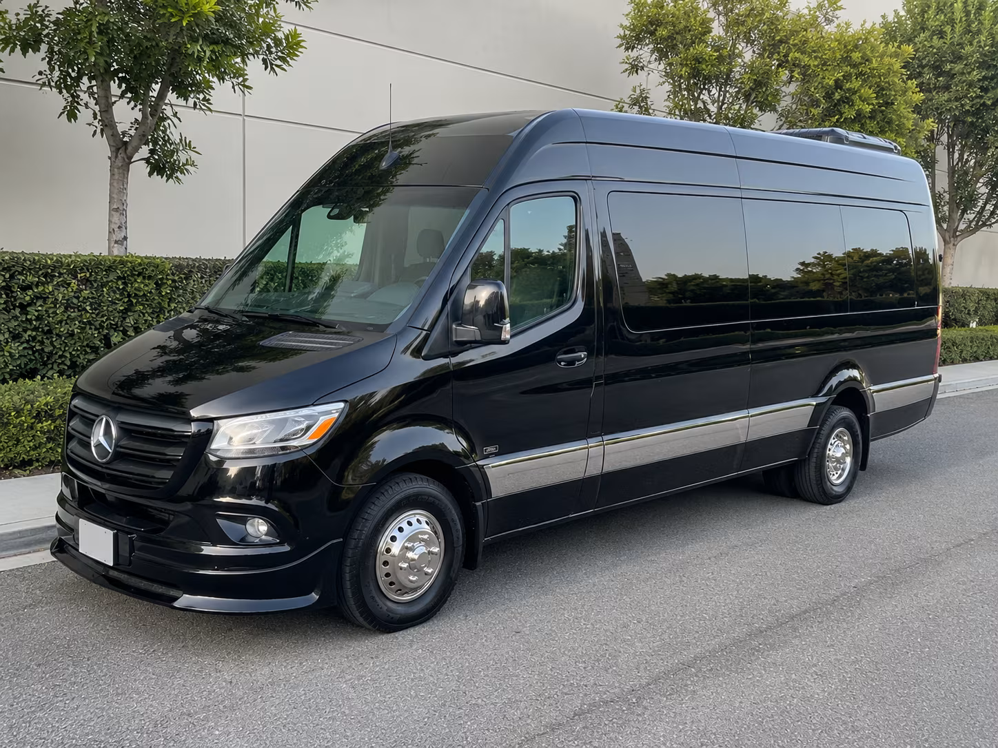 orange sprinter van with driver